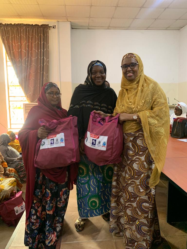 Director presenting the pad bank to 2 secondary schools in Kano