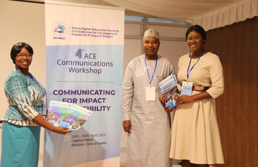 ACEPHAP Communication Officer, Bala Garba Abdullahi presenting copies of the maiden edition of ACEPHAP Newsletter to ACE IMPACT AAU Communication Officer, Ms. Milicent while ACE IMPACT AAU director of ICT, Ms. Nodumo Dlamini displays more copies.